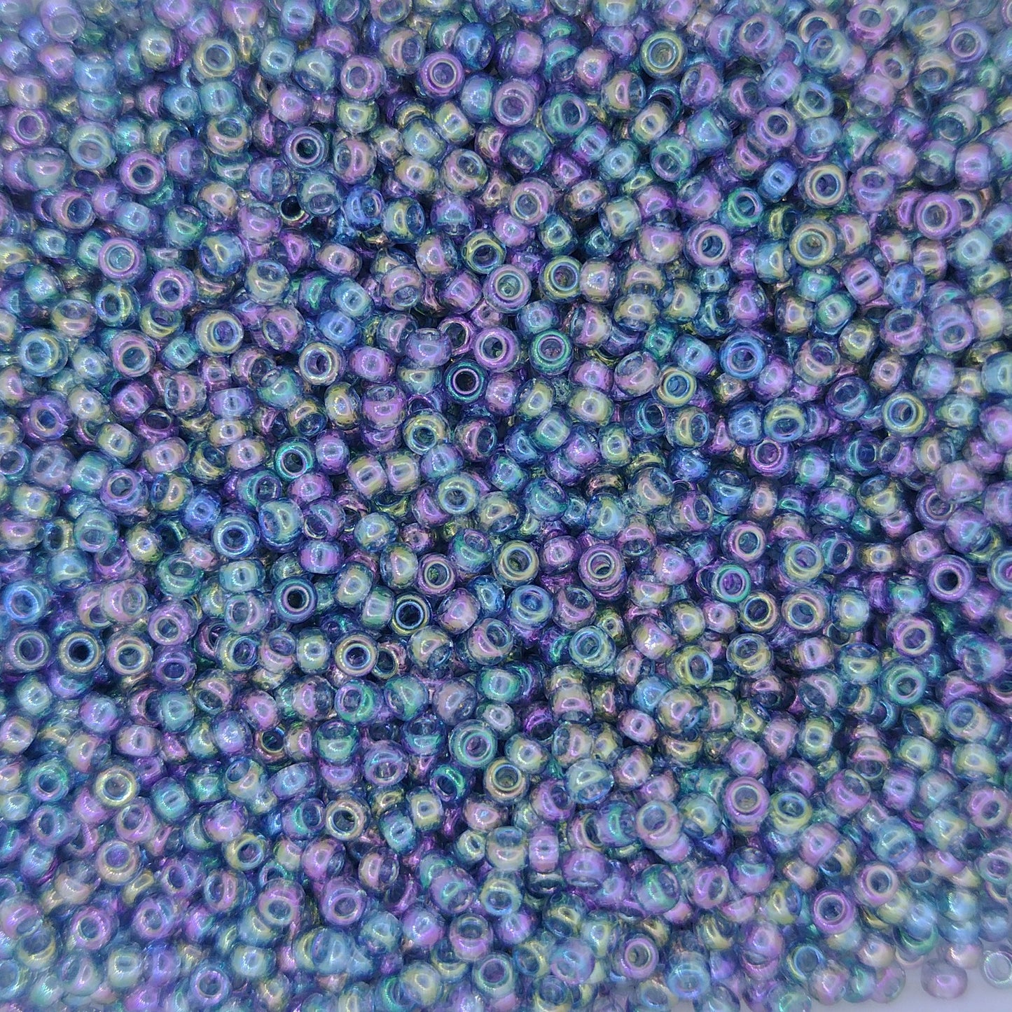 2444 - 50g Size 11/0 Miyuki seed beads in Transparent Blue Grey Rainbow Gold Lustre