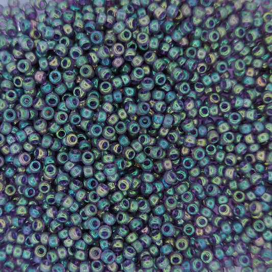 2446 - 10g Size 11/0 Miyuki seed beads in Transparent Dark Green Rainbow Lustre