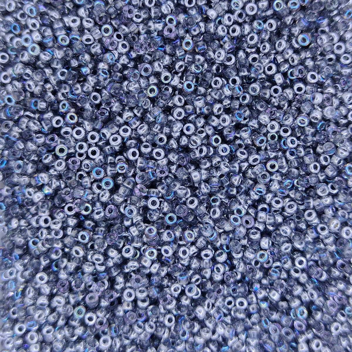 55017 - 25g Size 15/0 Miyuki seed beads in Crystal Silver Rainbow