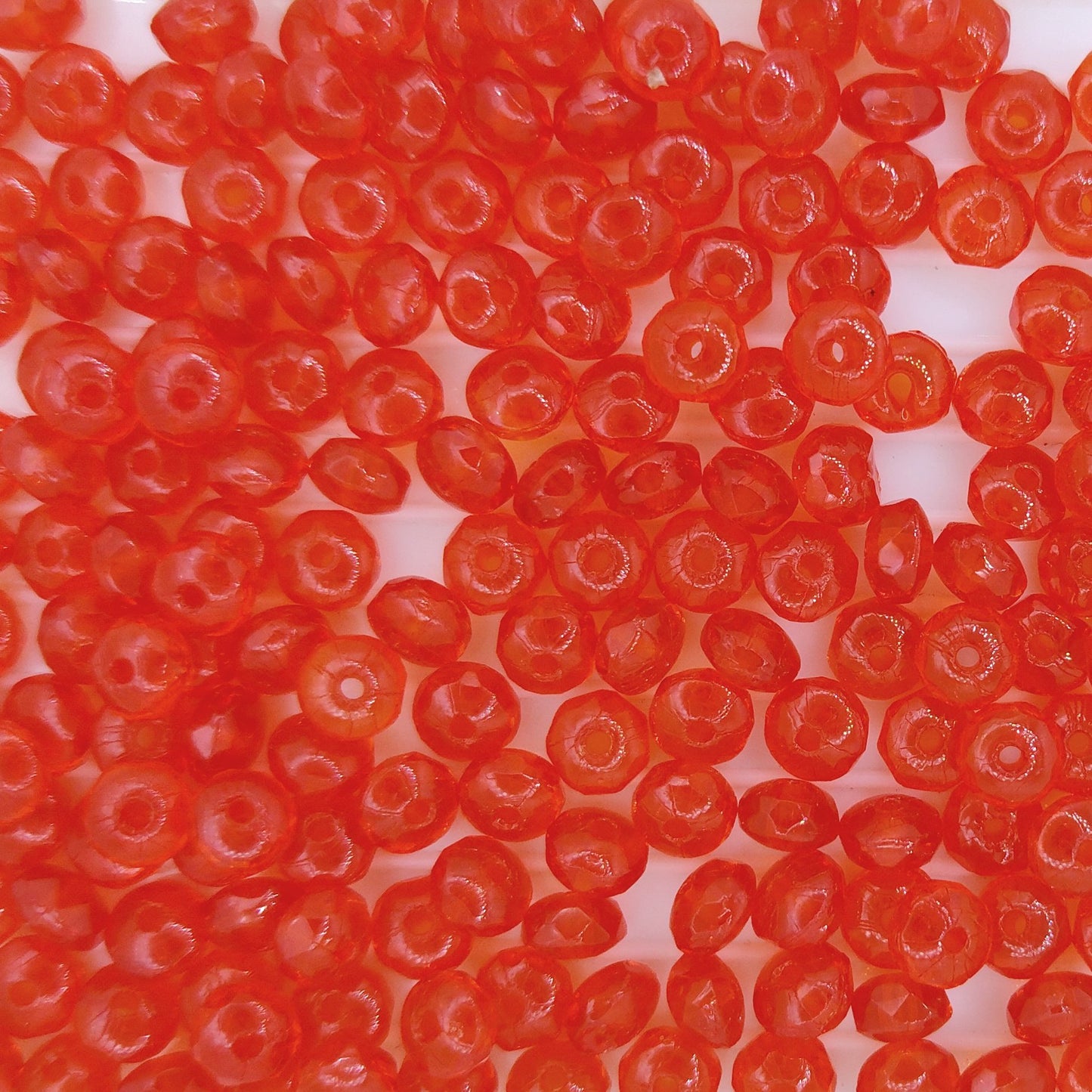 25 x faceted rondelles in Hyacinth Orange (2x3mm)