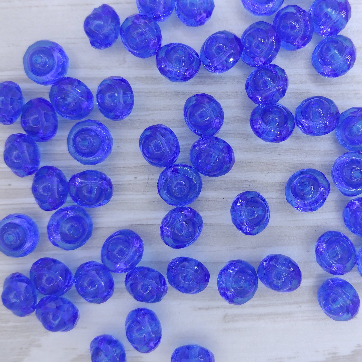 10 x Saturn beads in Sapphire (6x8mm)