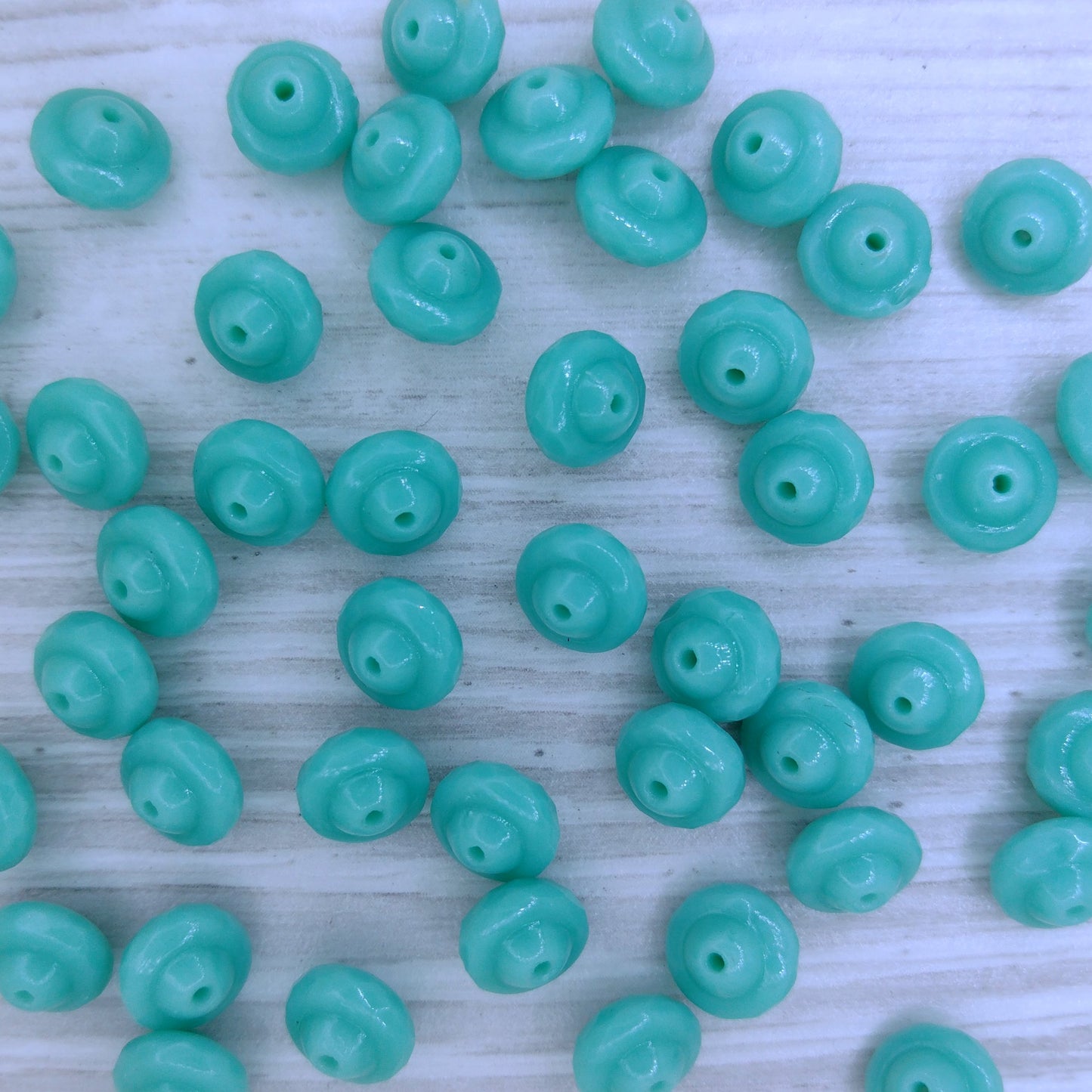 10 x Saturn beads in Turquoise (6x8mm)