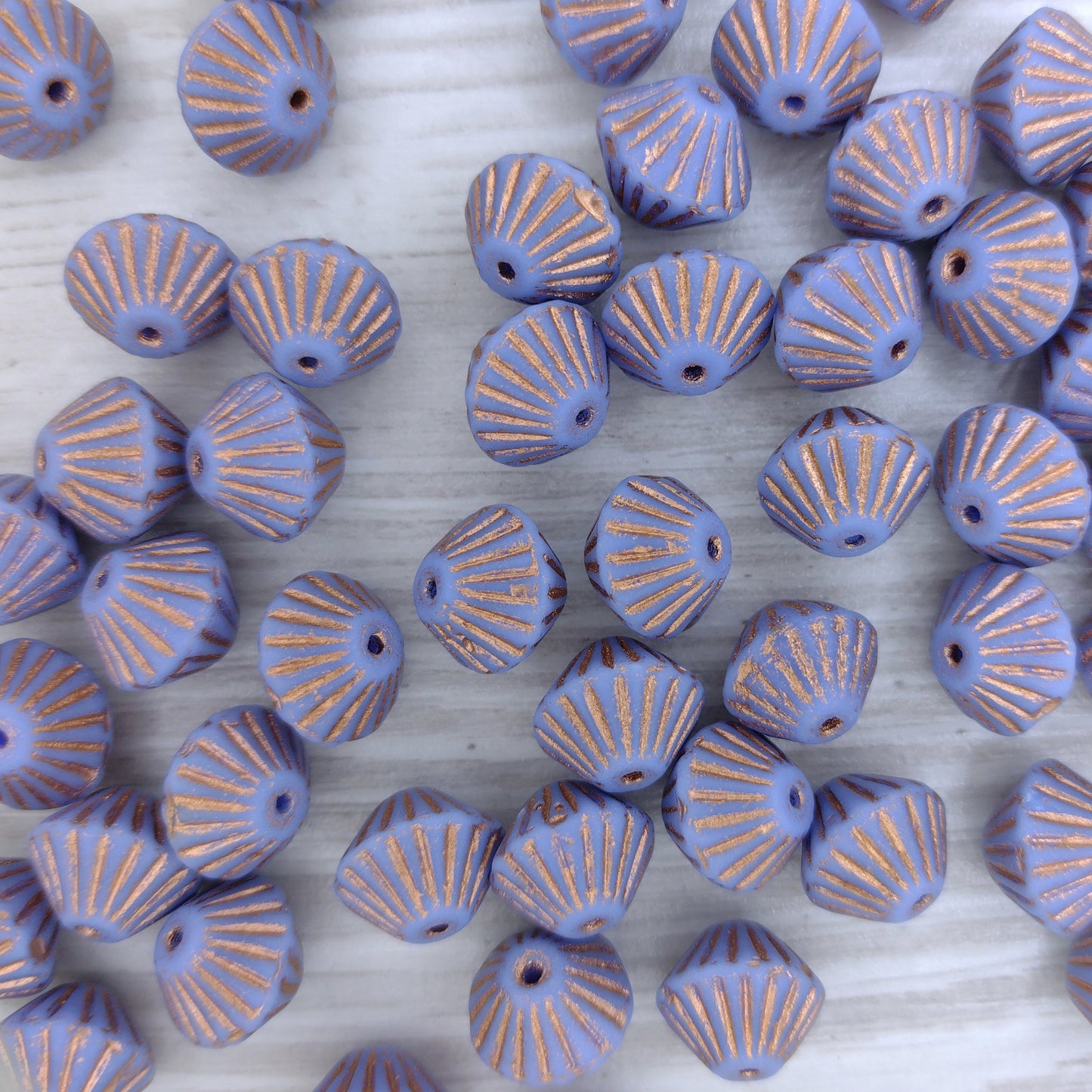 8 x 11mm Flutted bicones in Light Blue with Copper stripes