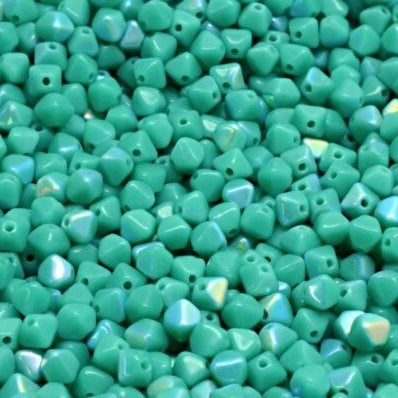 50 x 4mm pressed bicones in Jade AB