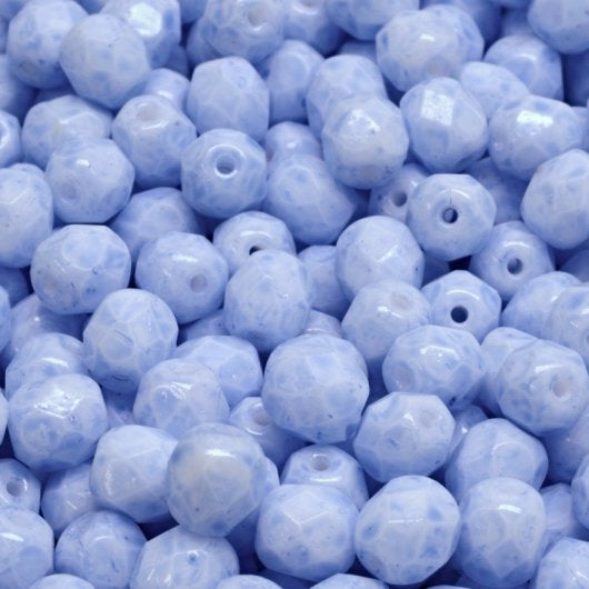 50 x 6mm faceted beads in Milky Light Sapphire