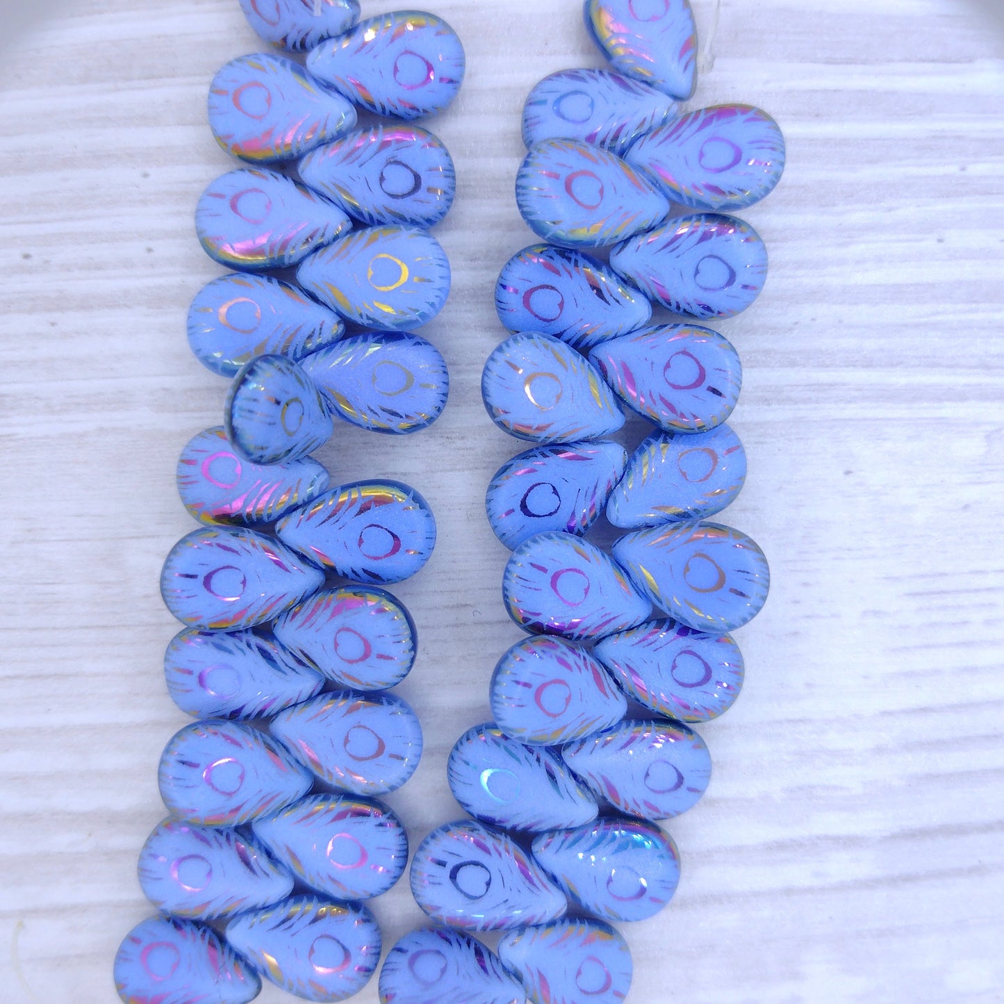 20 x Blue drops with Peacock feather (12x8mm)