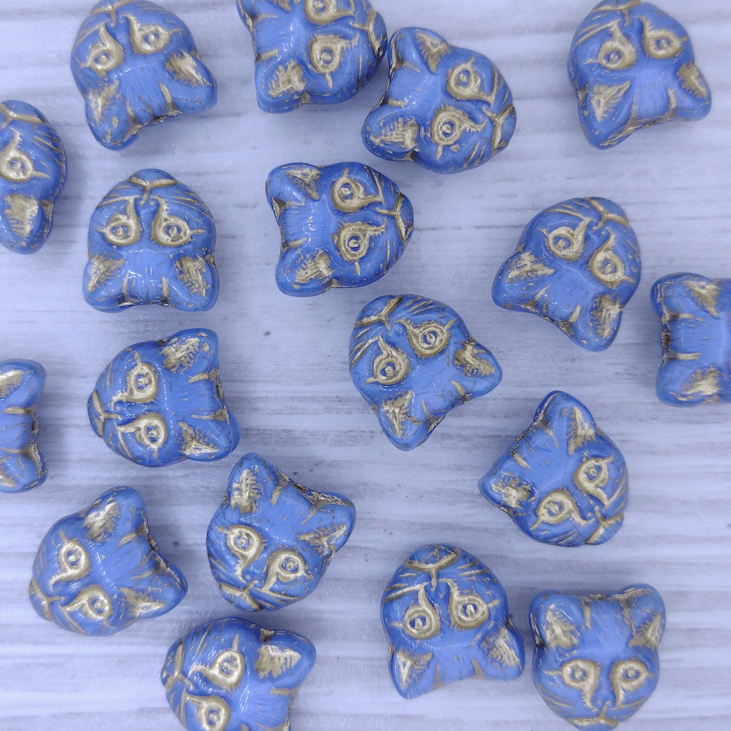 2 x 13mm Cat head beads in Blue with Gold