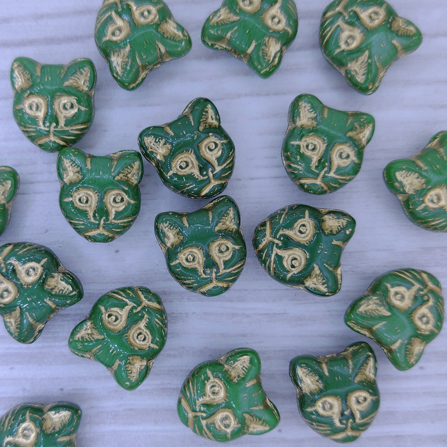 2 x 13mm Cat head beads in Green with Gold