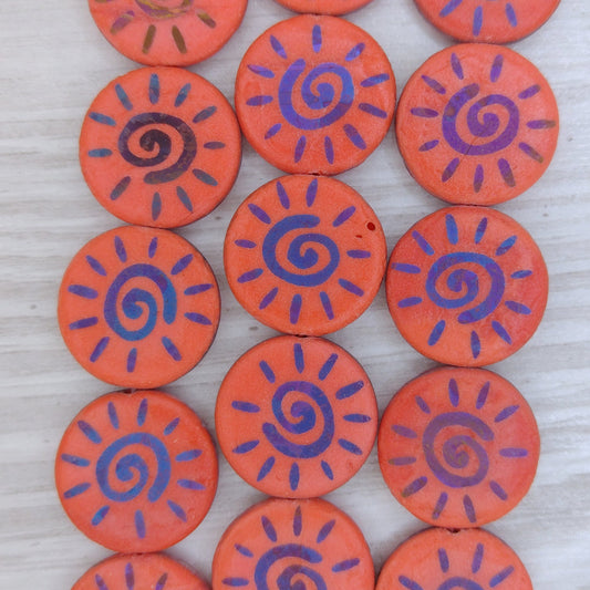 8 x 16mm discs in etched Orange with laser etched Sun