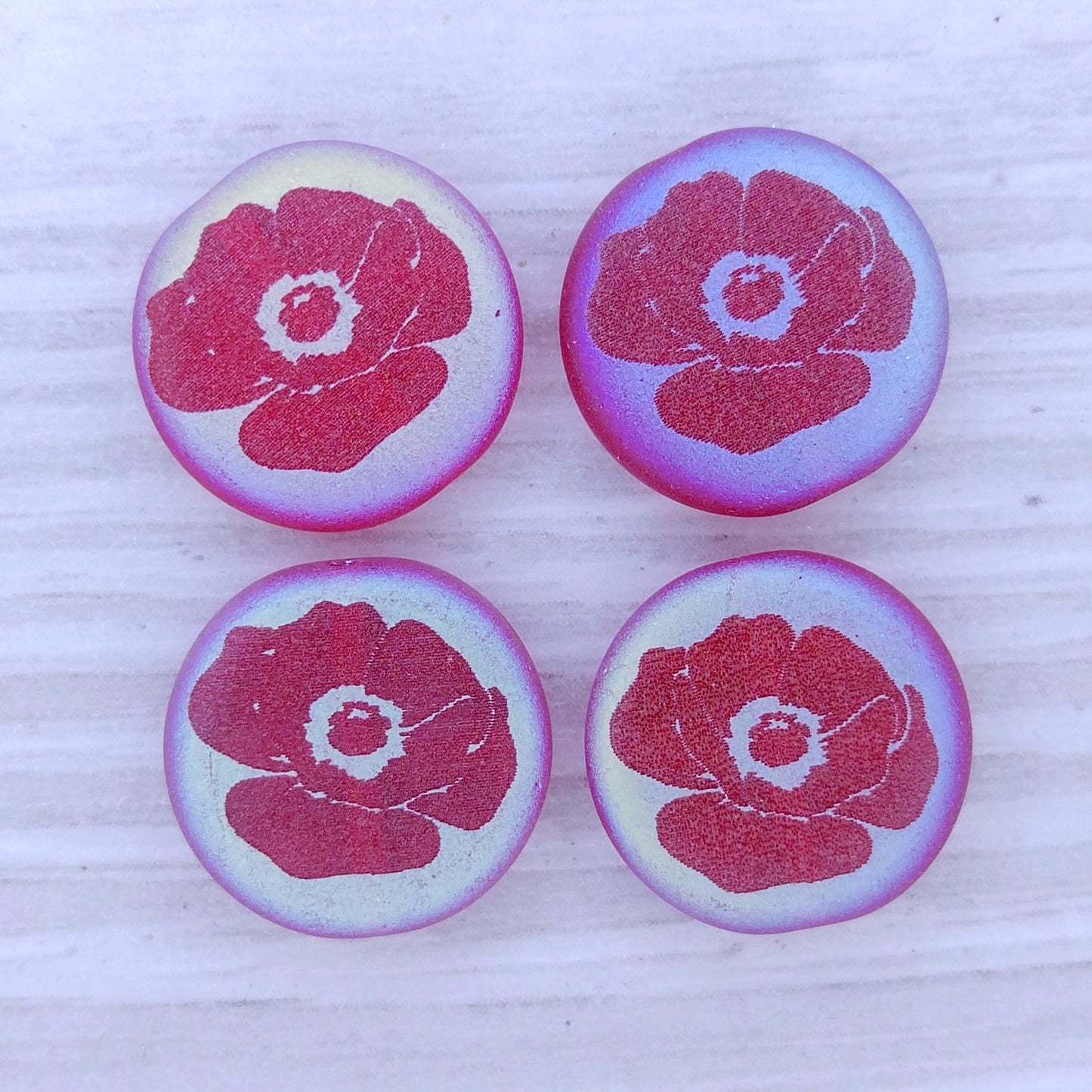 4 x 14mm discs in Matt Red with Poppy design