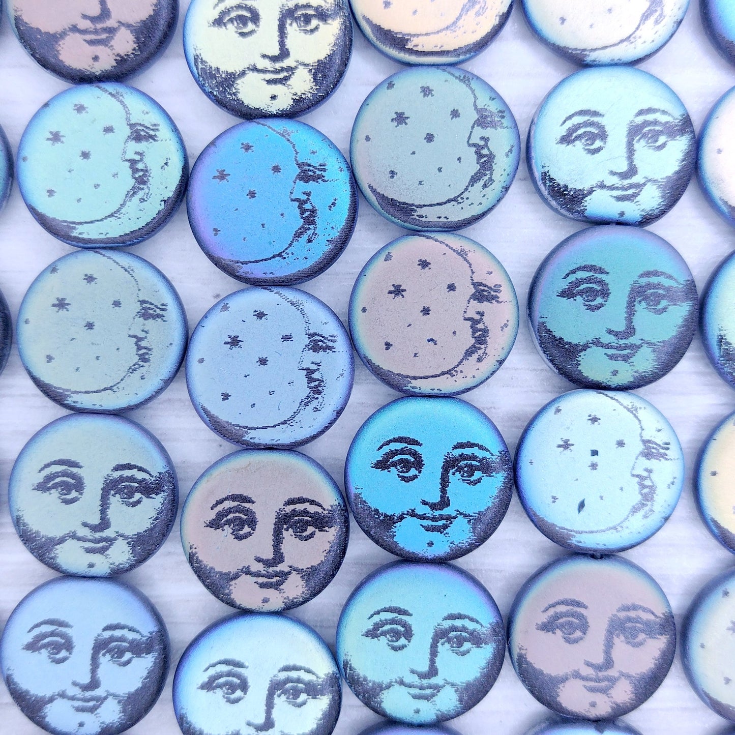 8 x 14mm discs in Matt Black with laser etched "Man in the Moon" mix