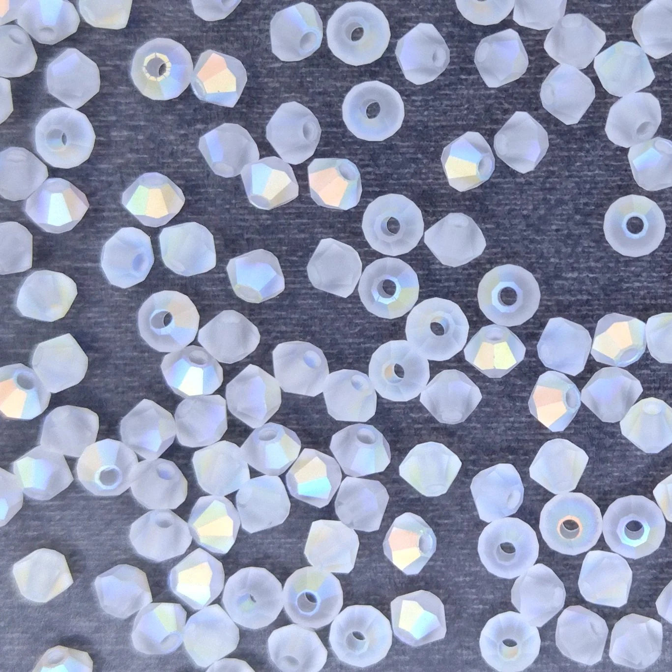 24 x 4mm bicones in Matt Crystal AB (Preciosa)