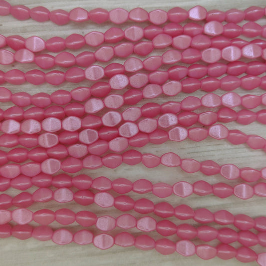 38 x pinch beads in Pastel Pink (3x5mm)