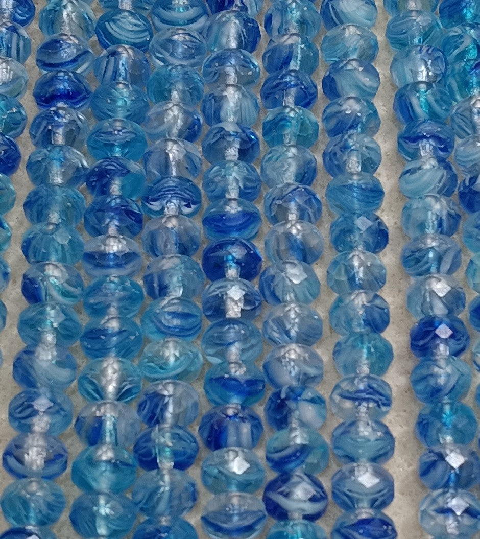 25 x faceted rondelles in Blue Marble (6x9mm)