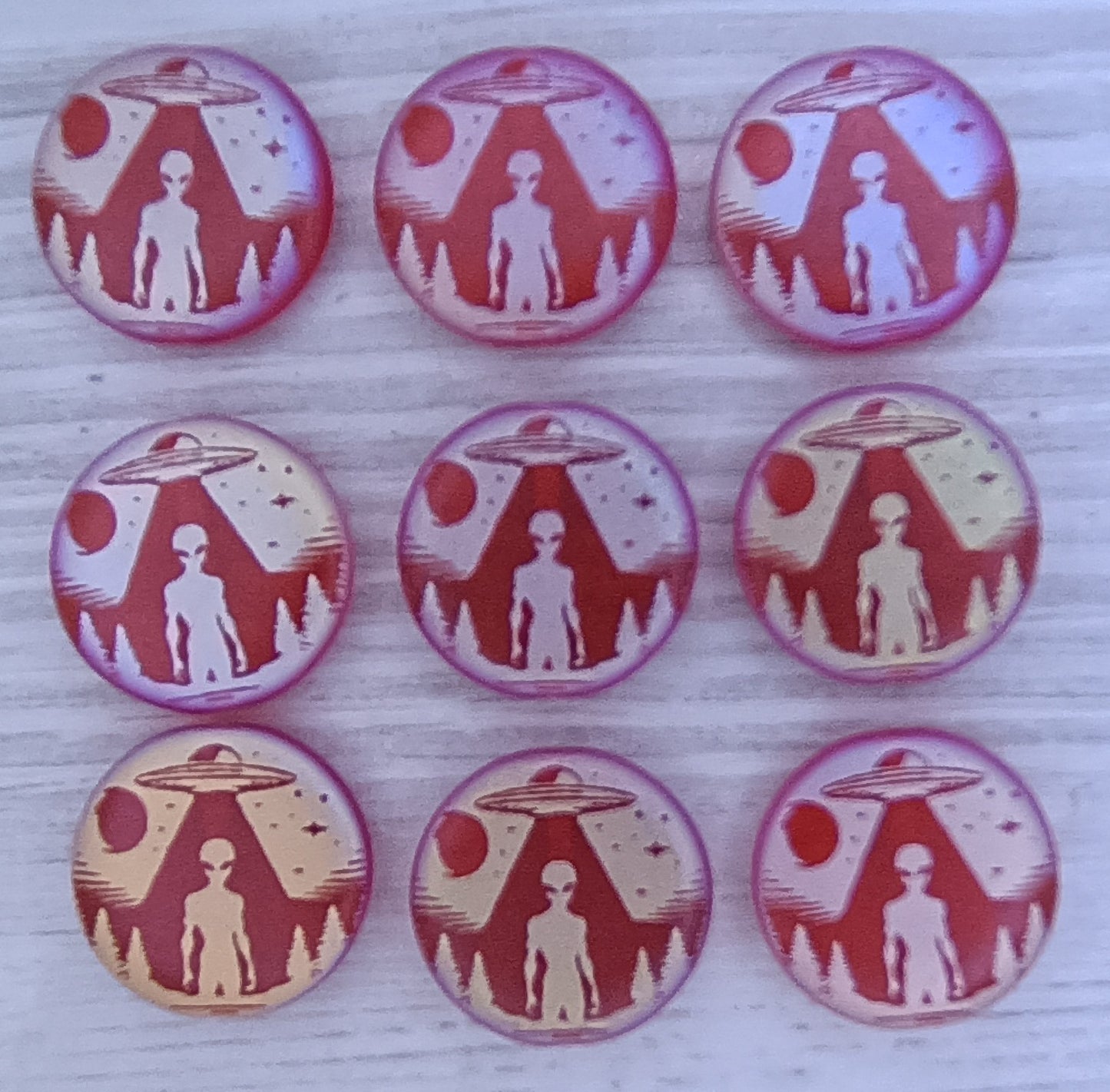 4 x 17mm disc beads in Matt Red with Alien