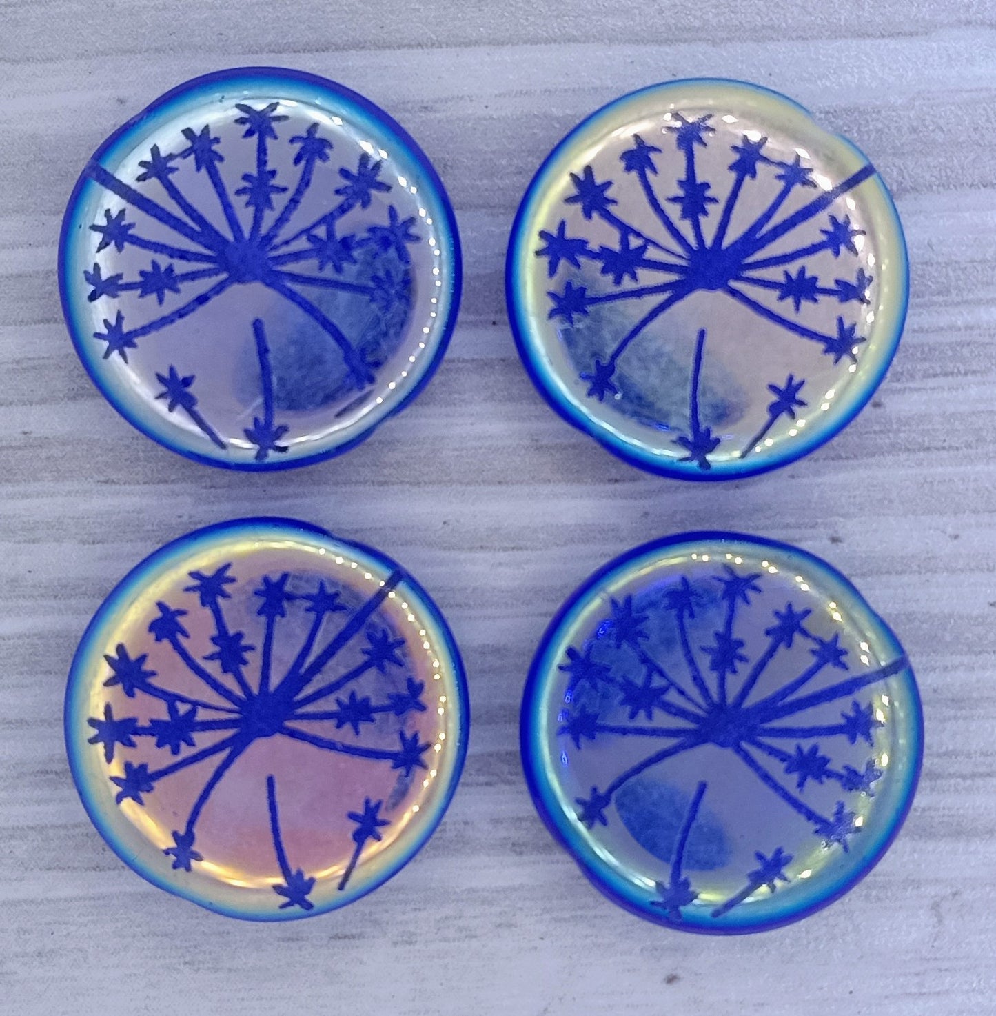4 x 17mm disc beads in Blue with Dandelion