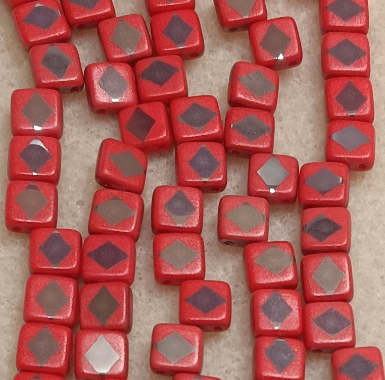 25 x 6mm Czech tiles in Light Red with Laser etched Chrome Diamond