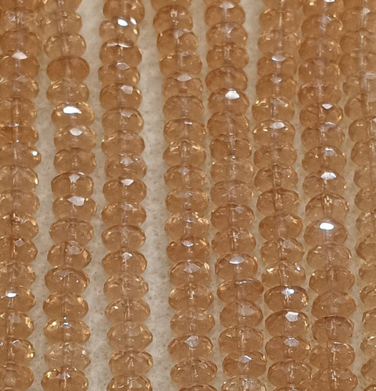 25 x faceted rondelles in Champagne Lustre (4x7mm)
