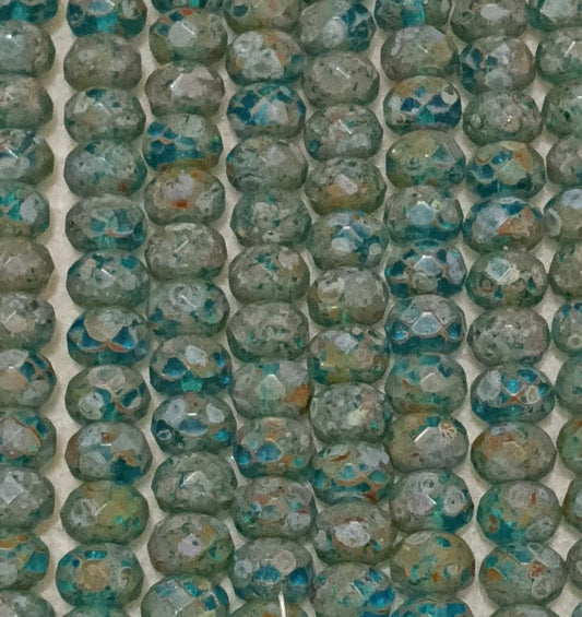 25 x faceted rondelles in Green Turquoise Picasso (6x9mm)