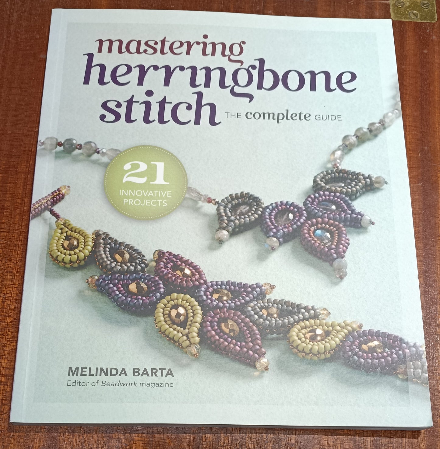 Paperback book - Mastering Herringbone Stitch by Melinda Barta