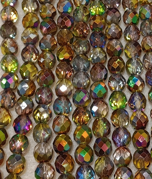 16 x 8mm faceted beads in Magic Green