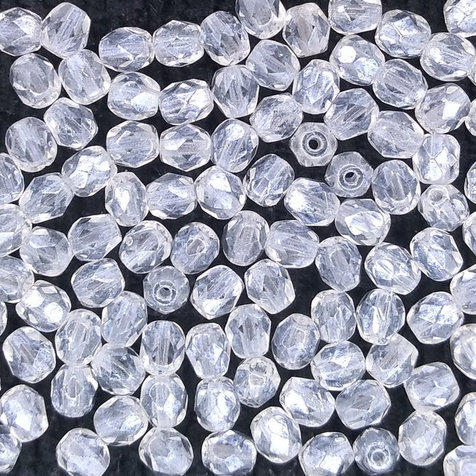 50 x 4mm faceted beads in Crystal Lustre