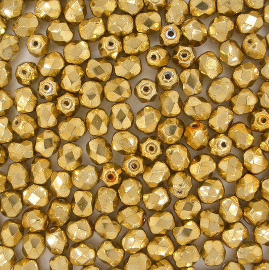 50 x 5mm faceted beads in Gold