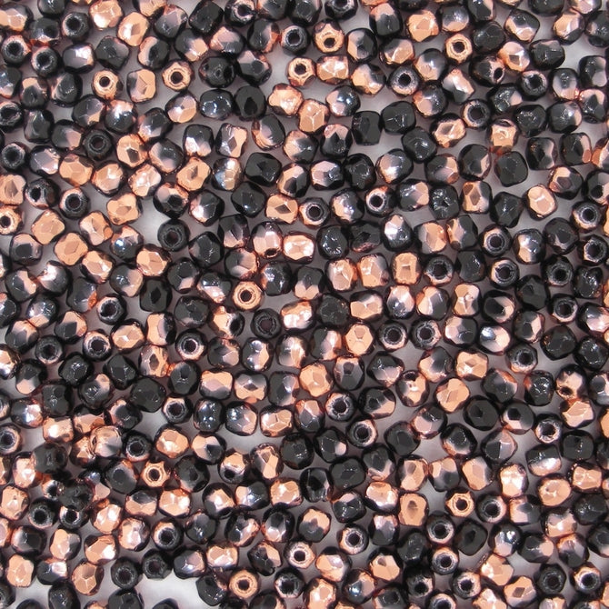 50 x 2.5mm faceted beads in Black/Capri Gold