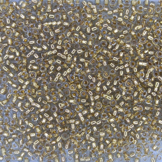 0955 - 5g Size 11/0 Miyuki seed beads in 24kt Gold lined Pale Grey