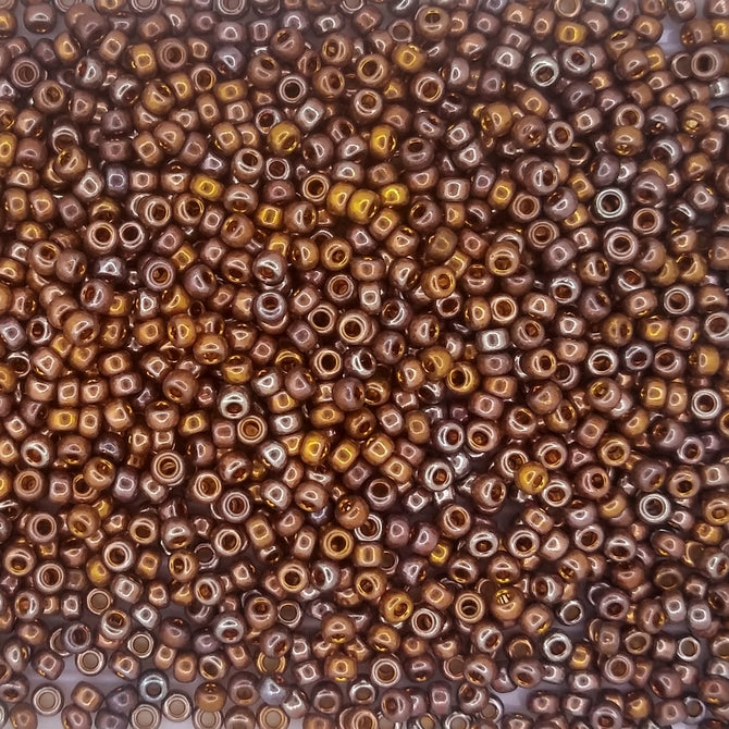 1984 - 2g Size 11/0 Miyuki seed beads in 24kt Red Gold Iris
