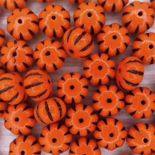 Pair of pumpkin beads in Orange/Black (8x11mm)