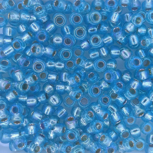1018 - 10g Size 6/0 Miyuki seed beads in Silver lined Aqua AB