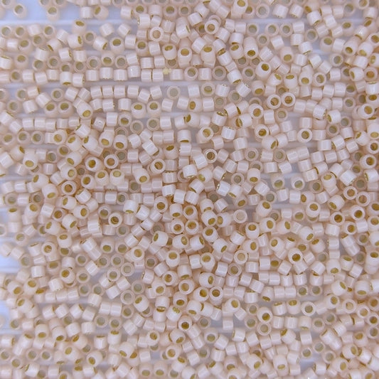 DB1452 - 25g Size 11/0 delicas in Silver lined Pale Peach Opal
