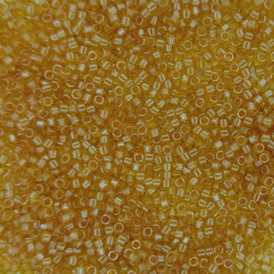 DB0119 - 1g Size 11/0 delicas in Transparent Honey Lustre