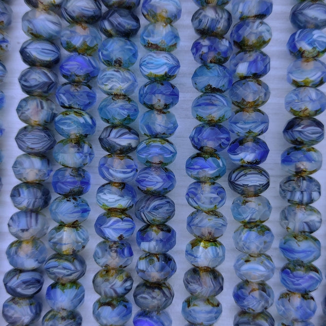 25 x faceted rondelles in Dark Blue Marble (6x9mm)