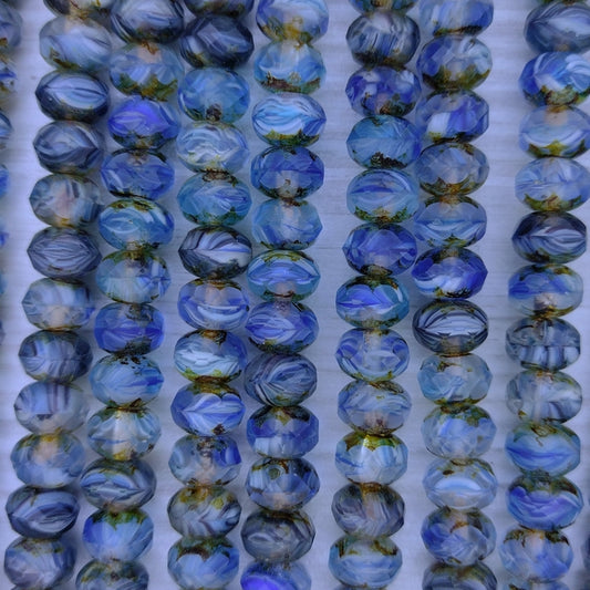 25 x faceted rondelles in Dark Blue Marble (6x9mm)