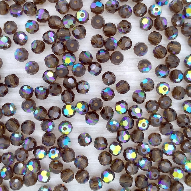 24 x 4mm round beads in Smoked Topaz AB (Preciosa)