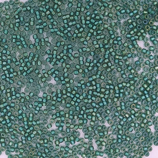 0270 - 5g Size 15/0 Toho seed beads in Metallic Teal lined Crystal