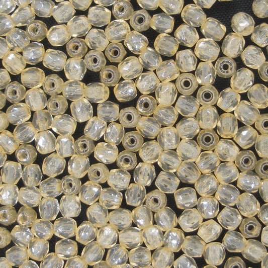 50 x 3mm faceted beads in Pale Lemon Lustre