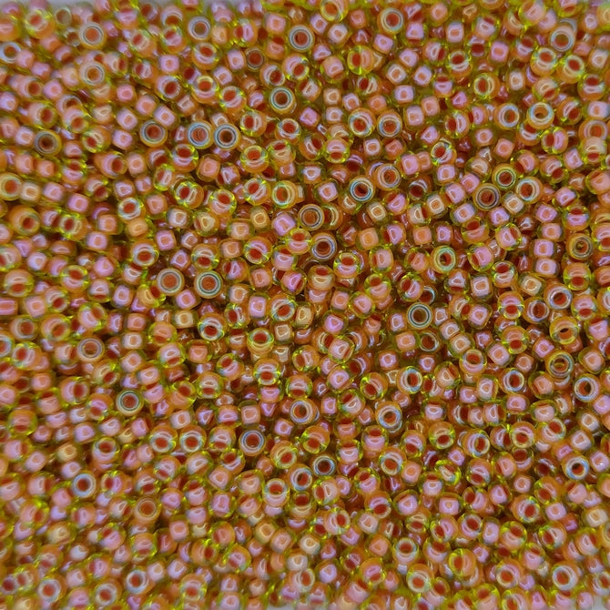 0345 - 10g Size 11/0 Miyuki seed beads in Salmon lined Peridot Lustre