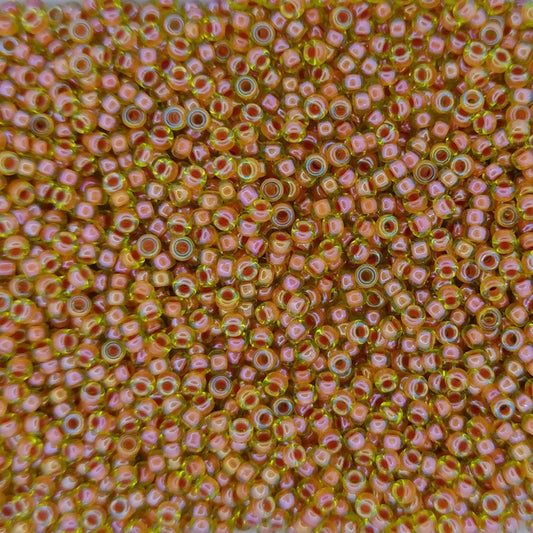 0345 - 10g Size 11/0 Miyuki seed beads in Salmon lined Peridot Lustre