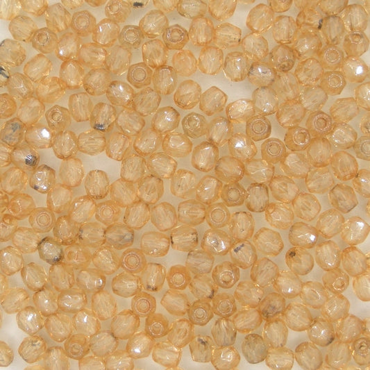 50 x 3mm faceted beads in Light Topaz