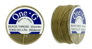 PT-50-8 - 50 yards of Toho One-G beading thread in Sand Ash