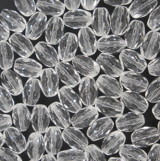 25 x faceted oval beads in Crystal (9x6mm)