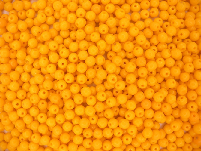 mix of 50 x 4mm round beads in Orange (1960s)