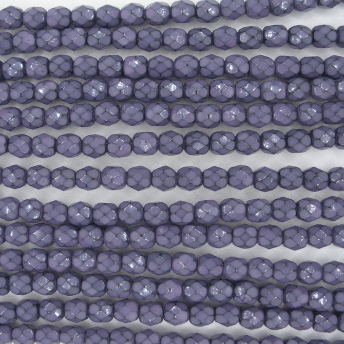 38 x 4mm snake skin beads in Dark Orchid