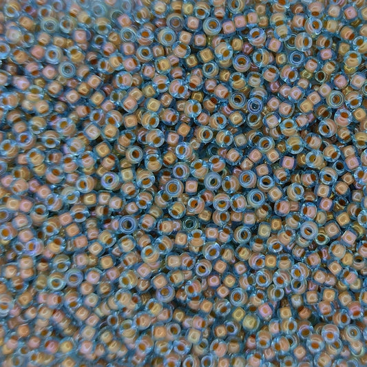 0351 - 10g Size 11/0 Miyuki seed beads in Peach lined Aqua Lustre