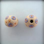 SB-85-F round bead in Purple circles and Orange dots from Golem Studio