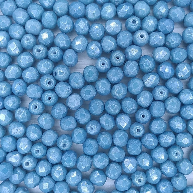 50 x 6mm faceted beads in Baby Blue Lustre