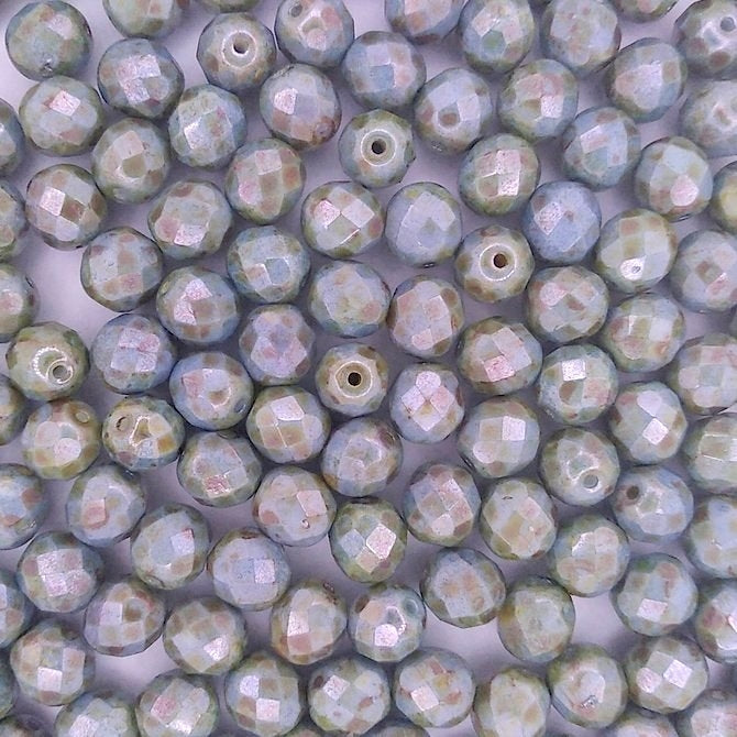 25 x 8mm faceted beads in Opaque Blue Lustre